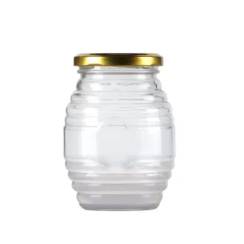 Clásico tarro de cristal para miel con tapa metálica para colmena