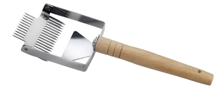 tenedor desoperculador