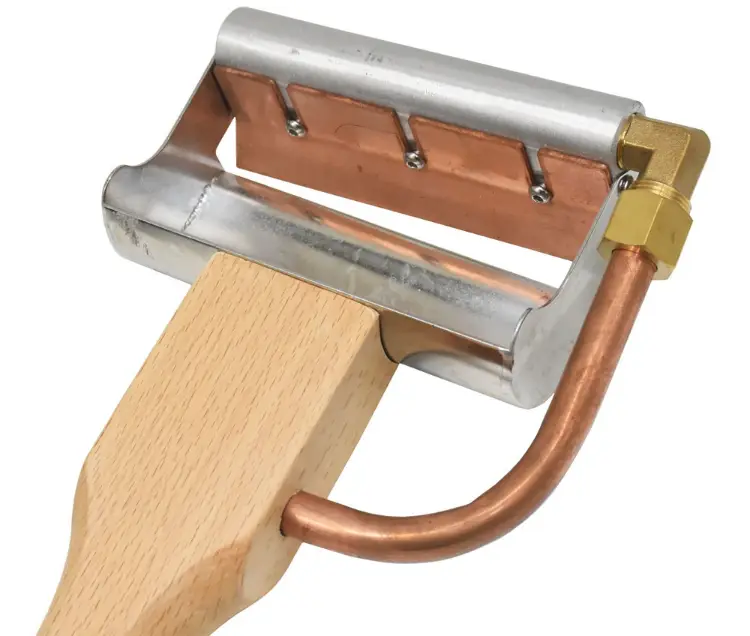 Uncapping scraper